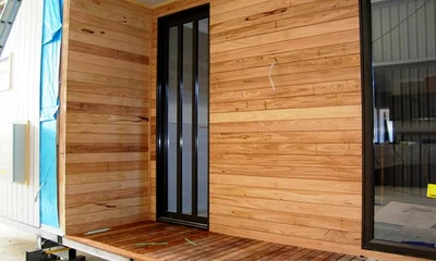 5 -  lock-up stage, weathertex & timber cladding installed.jpg